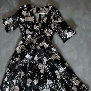 Unique Vintage 1950s Black & White Floral Delores Swing Dress with Sleeves